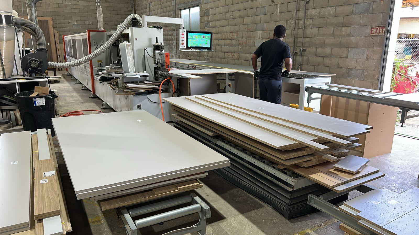 Automated panel saw at LEGNO Cabinets factory in Okahumpka Florida